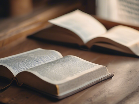 Two Bibles open on a table