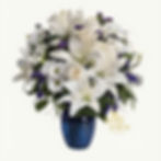 White lilies, roses bouquet in blue vase