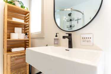 Clean bathroom with stand-up shower, Parkview Cottage in Youngstown, NY.