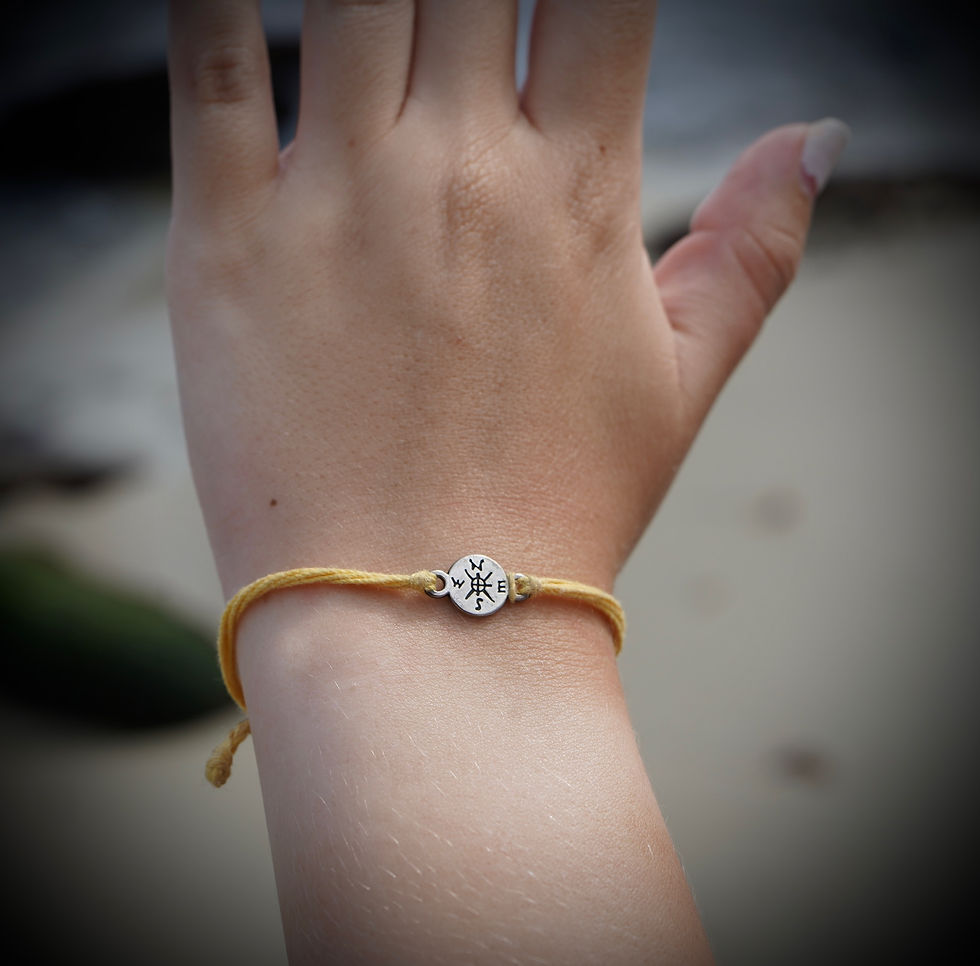 Yellow bracelet with paw print charm, a custom event accessory