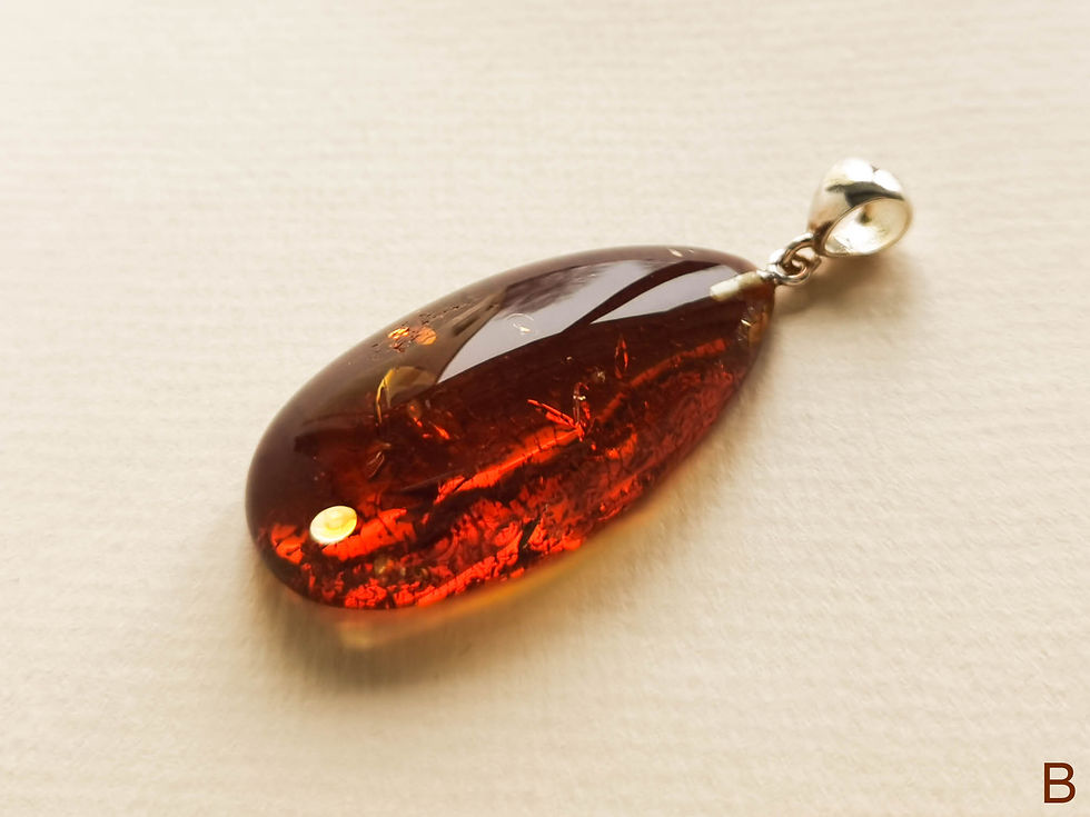 Thumbnail: Medium size oval shape shiny dark cognac natural amber pendant