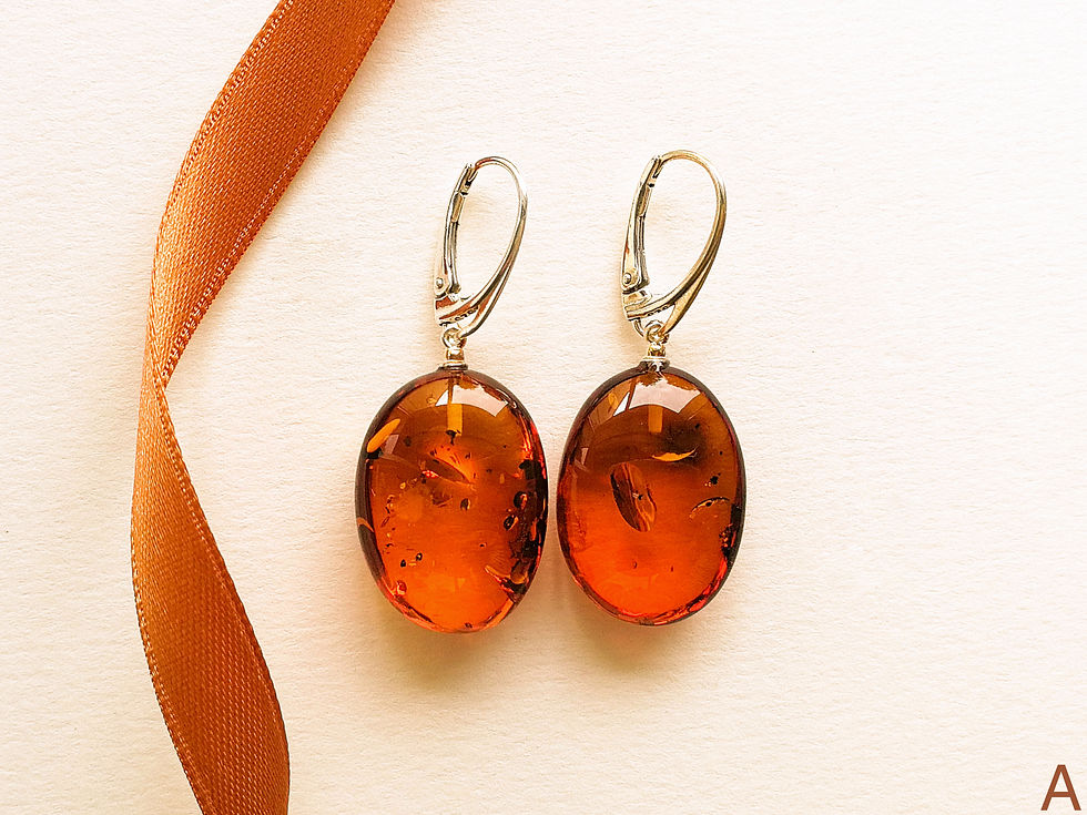 Small bright cognac oval shape amber earrings