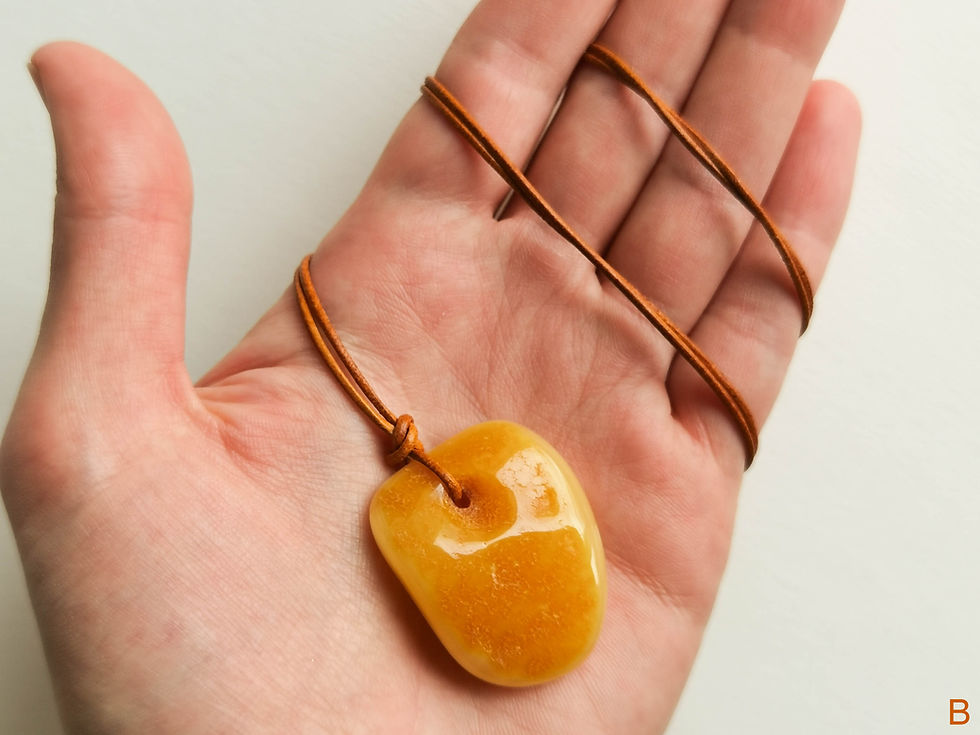Thumbnail: Matt yellow color natural amber pendant on leather strand with natural hole