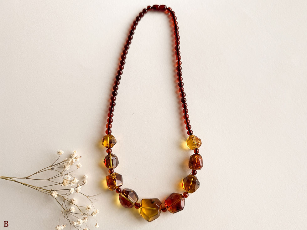 Thumbnail: Faceted cognac and red amber necklace with cherry round beads