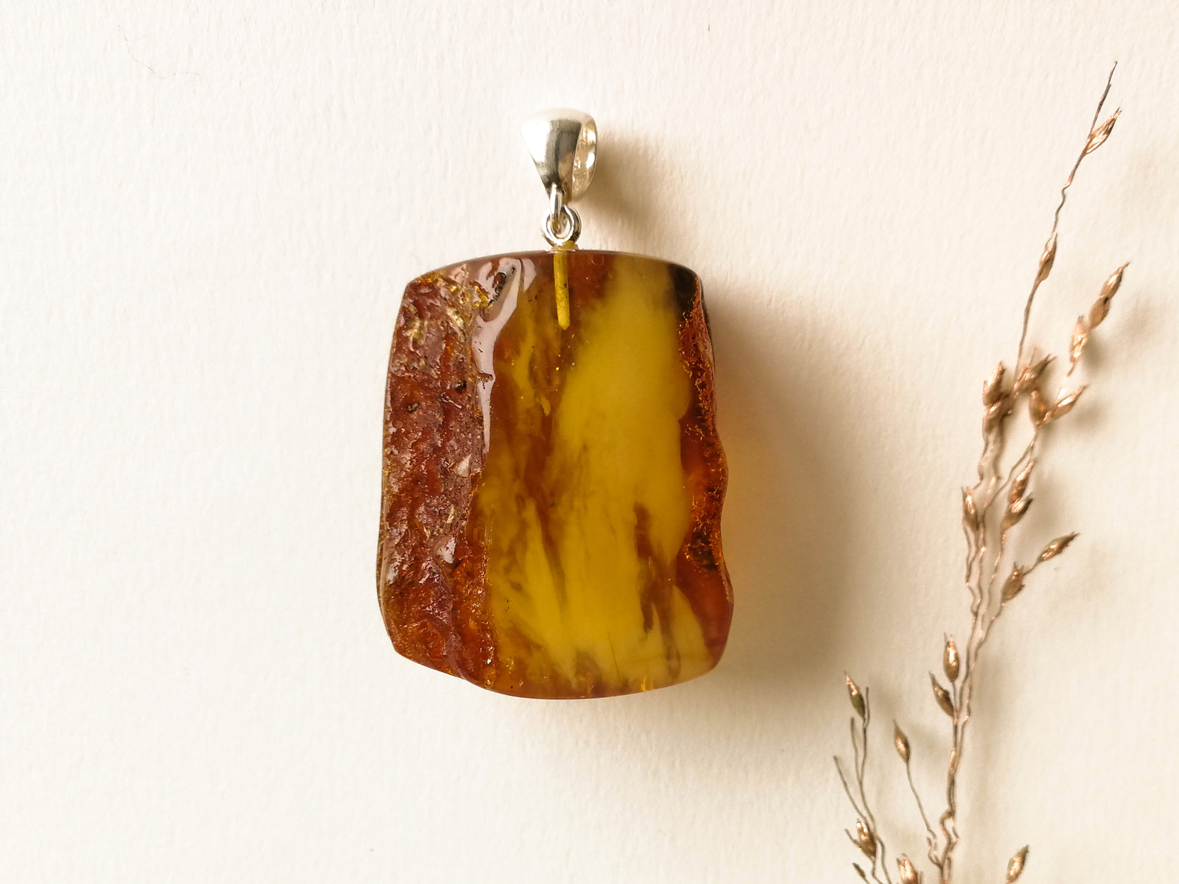 Not heated natural caramel brown Baltic Amber pendant