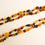 Thumbnail: Natural amber mix color very long beans necklace
