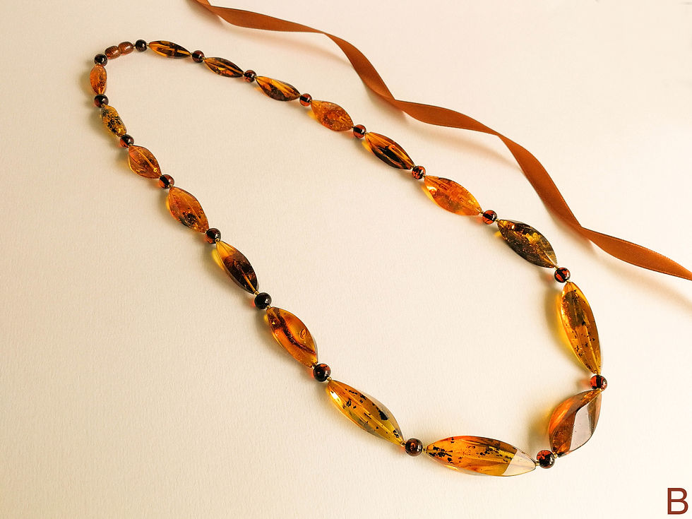 Thumbnail: Dark cognac and green natural amber twisted beads necklace