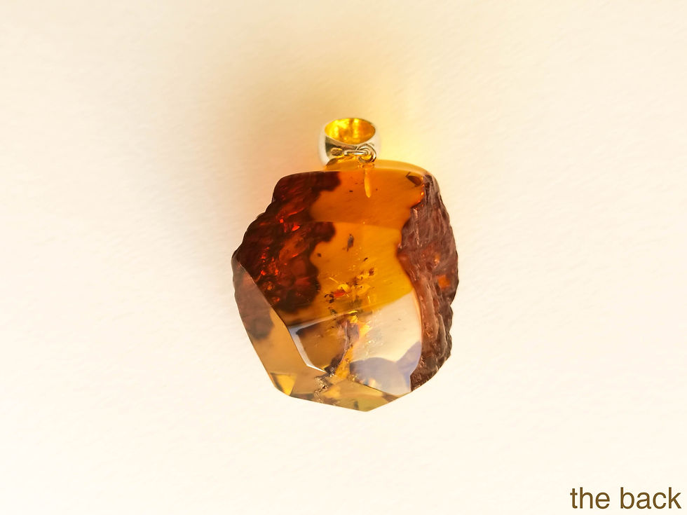 Thumbnail: Cognac color unique faceted shape genuine amber pendant