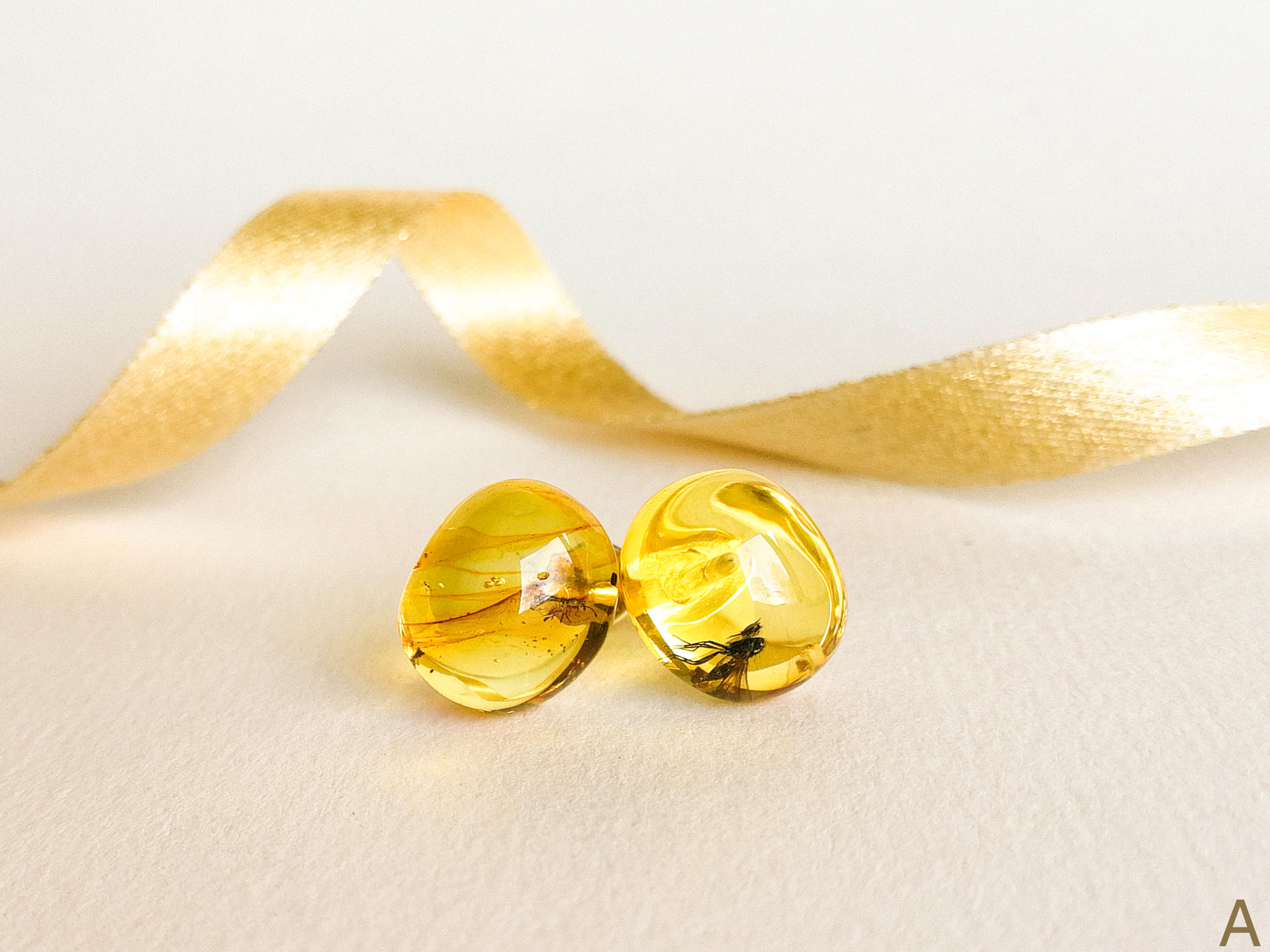 Small oval/round shape lemon color amber earrings with wow insects