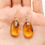 Thumbnail: Very small oval shape natural amber lemon color earrings with insects