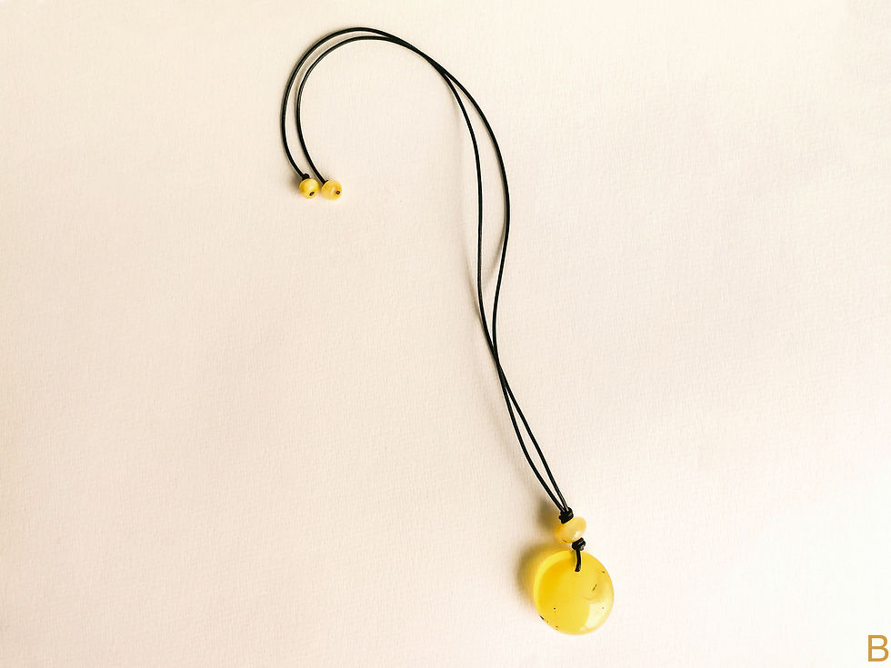Thumbnail: Small matt yellow color amber donut pendant necklace on leather strand