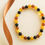 Thumbnail: 6,5 mm - 8 mm - 9 mm perfect round natural amber mix color beads bracelet
