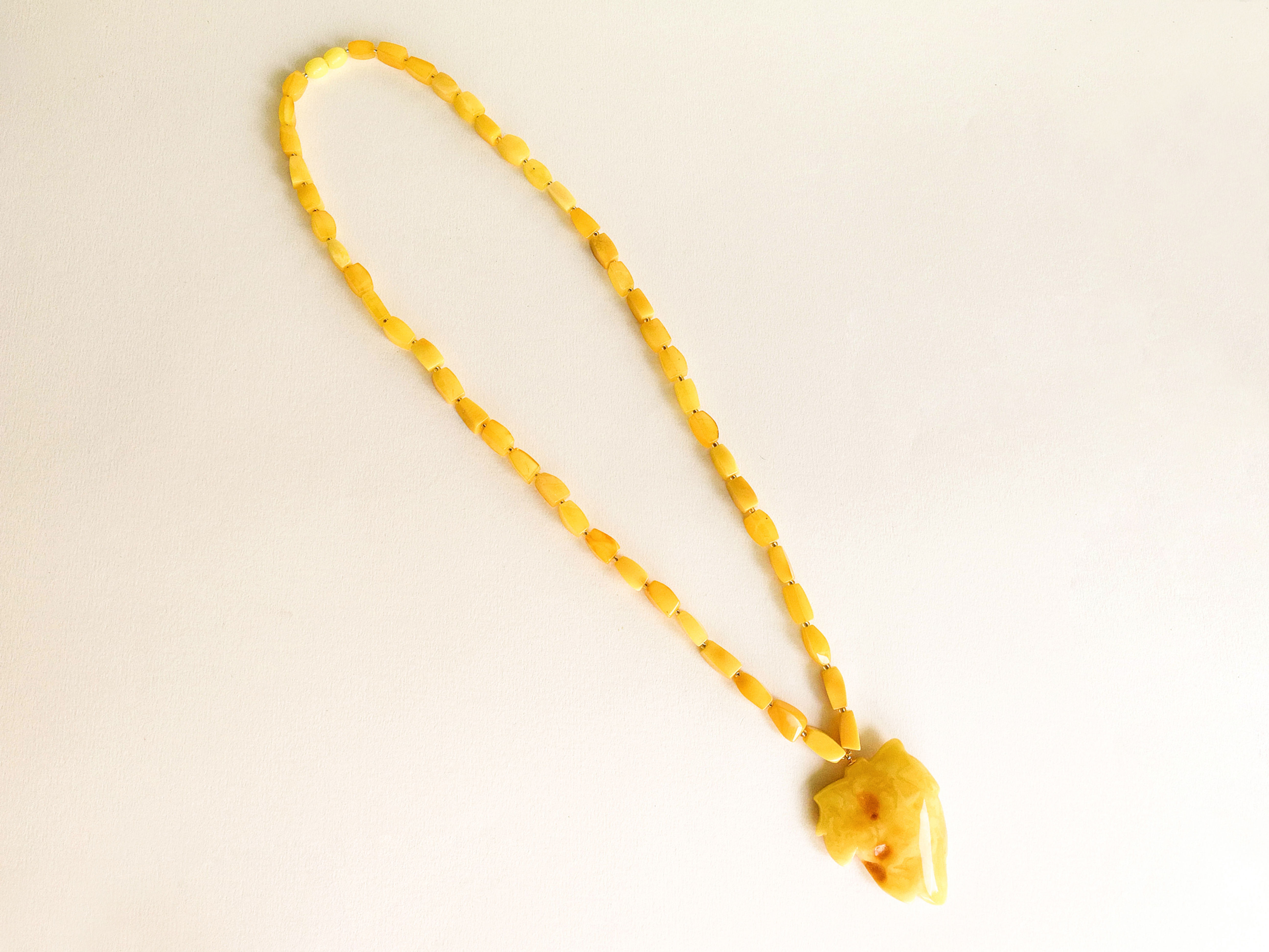 Not heated matt yellow amber leaf pendant on rectangle beads necklace