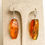 Thumbnail: Cognac color large rectangle shape genuine amber earrings