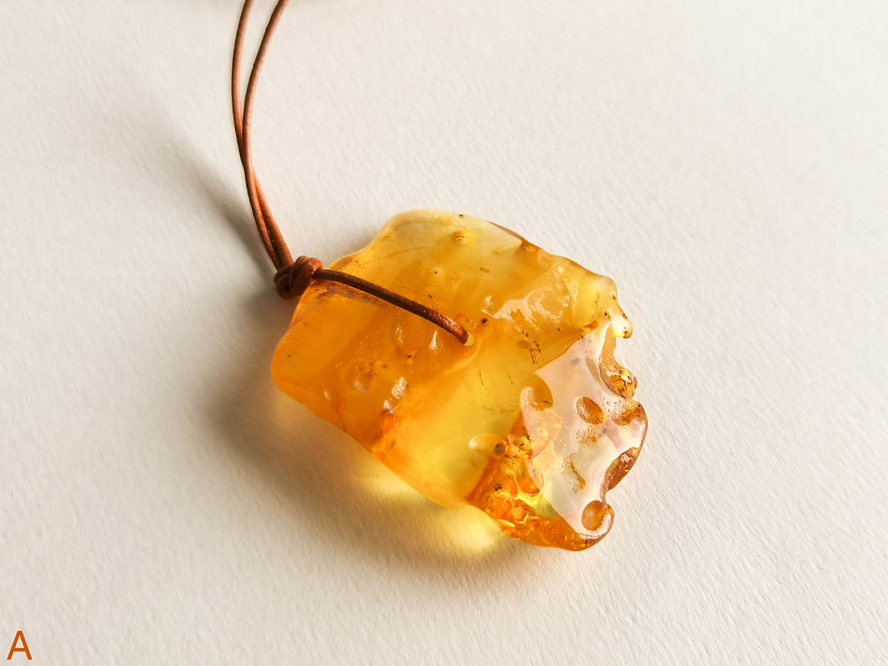Thumbnail: Matt yellow color natural amber pendant on leather strand with natural hole