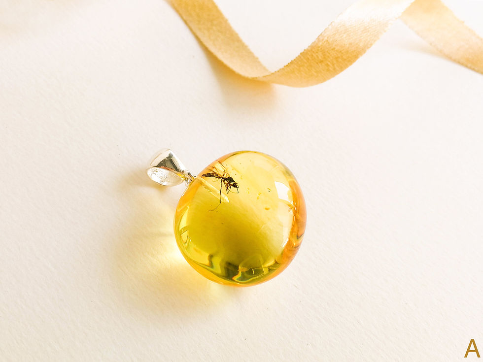 Thumbnail: Almost round shape genuine amber pendant with insect in lemon/cognac color