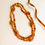 Thumbnail: Natural amber bright cognac color 7 large oval beads necklace