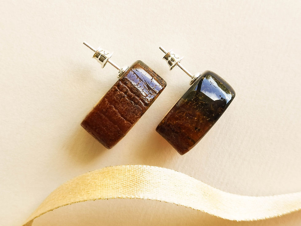 Thumbnail: Unique cognac and green colors oval amber stud earrings