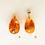 Thumbnail: Petite egg/oval shape genuine amber pendant in cognac color
