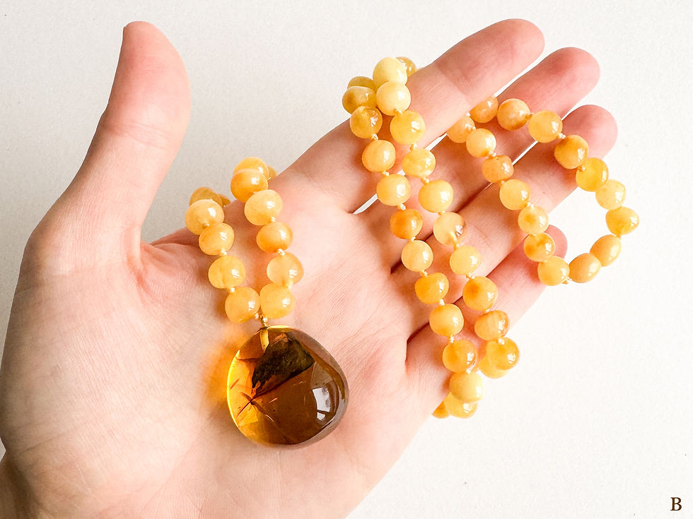 Thumbnail: Clear lemon natural amber pendant with insects on round matt yellow necklace