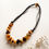 Thumbnail: Natural amber brown and earth colors raw 50/50 style nuggets necklace