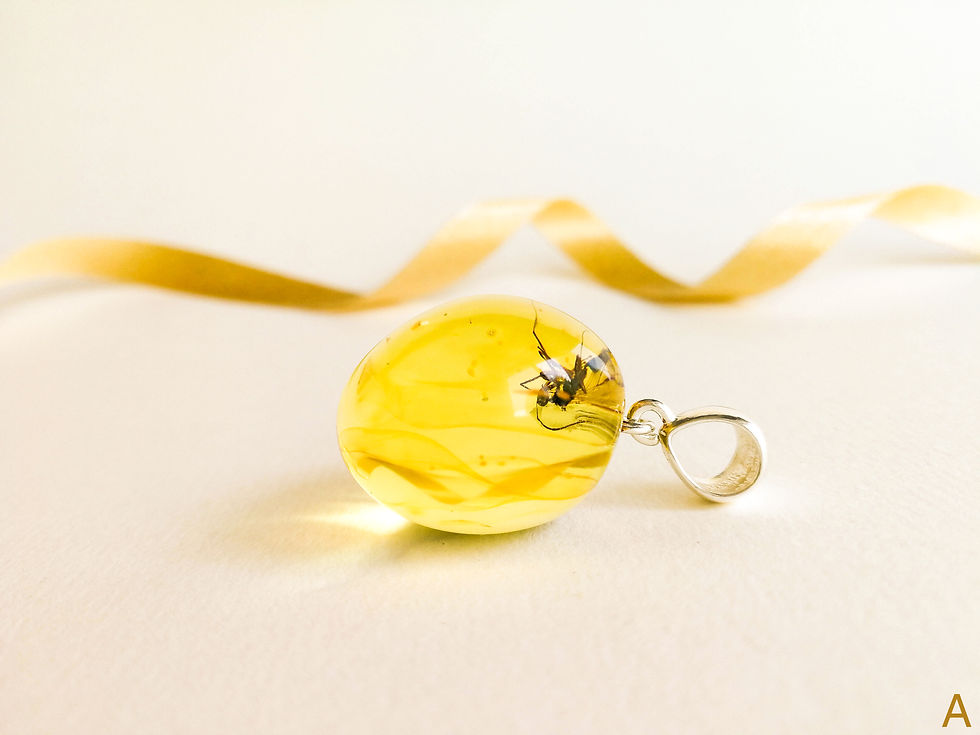Thumbnail: Almost round shape genuine amber pendant with insect in lemon/cognac color