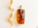 Thumbnail: Dark cognac large rectangle shape genuine amber pendant
