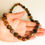 Thumbnail: A set of 8 Dark green and brown colors natural amber necklaces