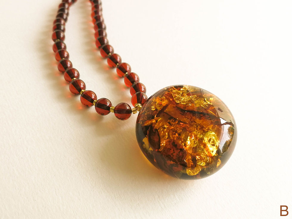 Natural amber cherry color necklace with a large round pendant