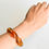 Thumbnail: Very large natural shapes genuine amber bracelet in cognac color