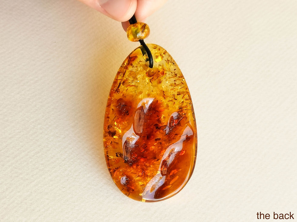 Thumbnail: Genuine cognac color light amber pendant on natural leather strand