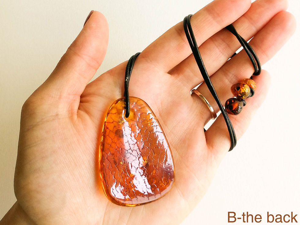 Thumbnail: Cognac color natural amber flat drop shape pendant with genuine leather strand