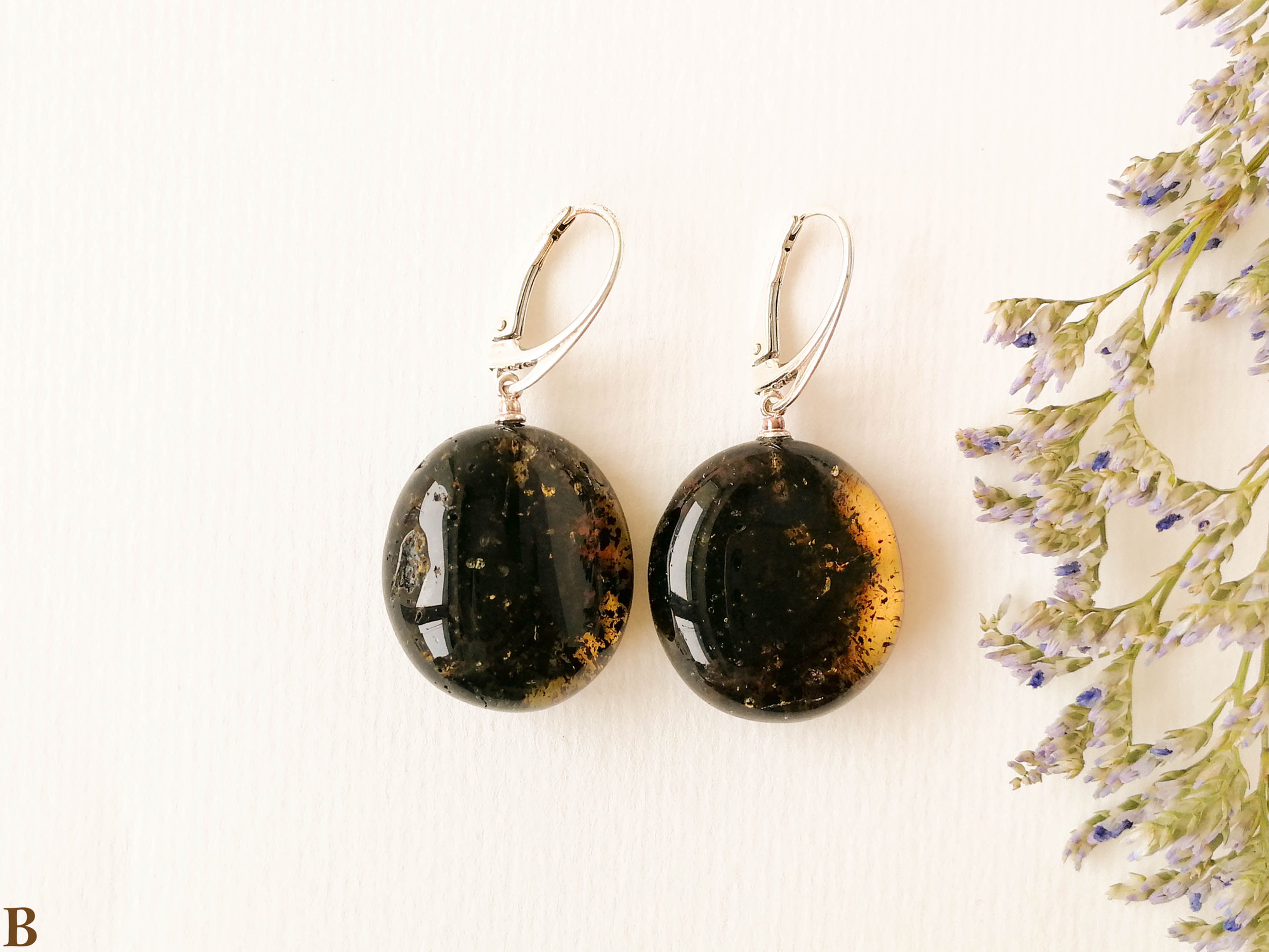 Natural Baltic amber coin shape earthy colors earrings