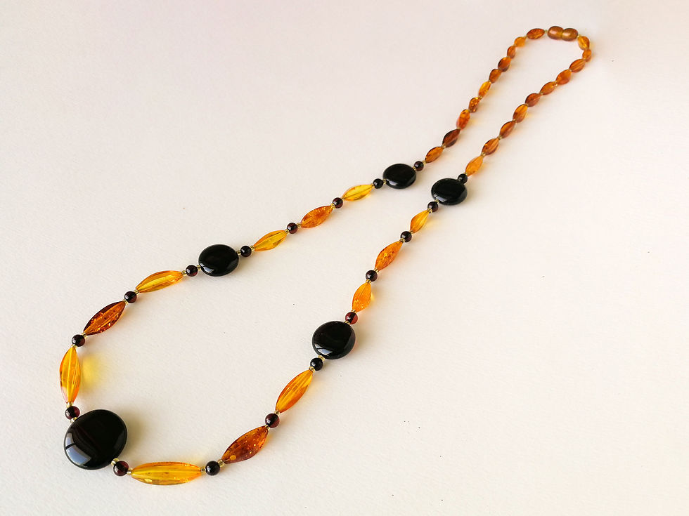 Thumbnail: Cognac color almonds and cherry coin shape beads amber necklace