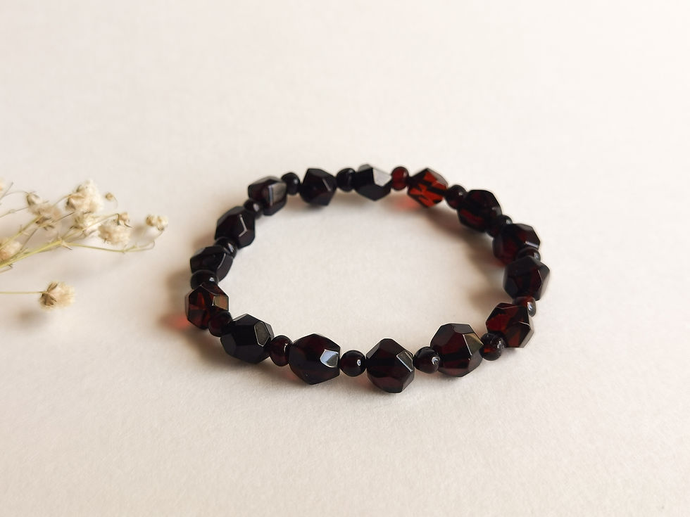 Thumbnail: Dark cherry color round faceted beads natural amber bracelet
