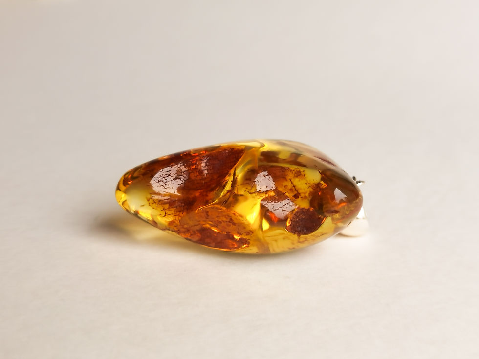 Thumbnail: Natural Baltic amber cognac upside triangle pendant