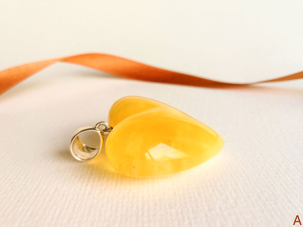 Thumbnail: Large natural not heated matt yellow amber heart pendant