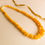 Thumbnail: Matt yellow color natural amber nuggets necklace