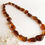 Thumbnail: Cognac color genuine amber natural shape beads everyday necklace
