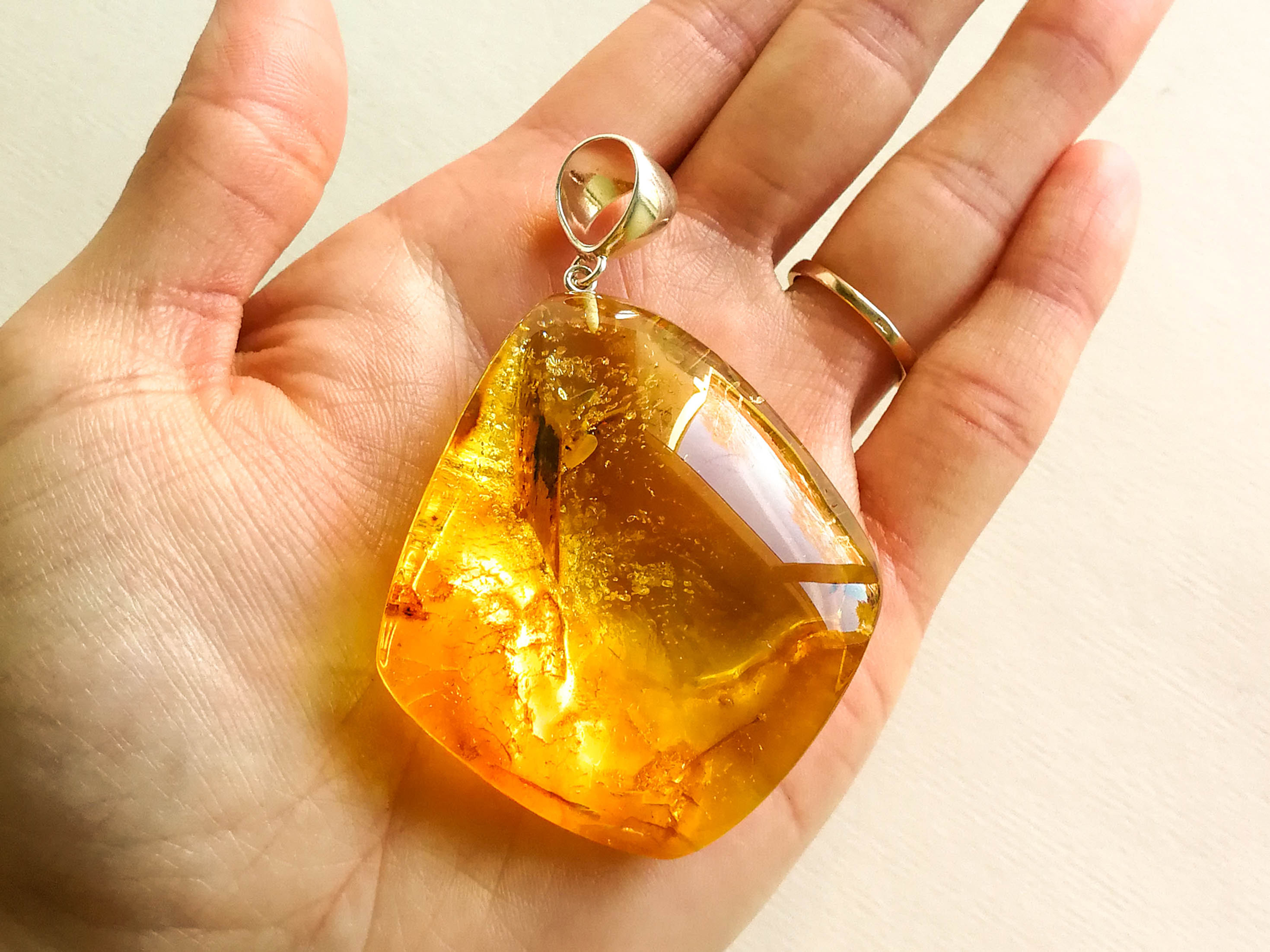 Rhombus shape natural amber light yellow color pendant
