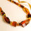 Thumbnail: Dark cognac/ light cherry natural amber large rectangle shape beads necklace