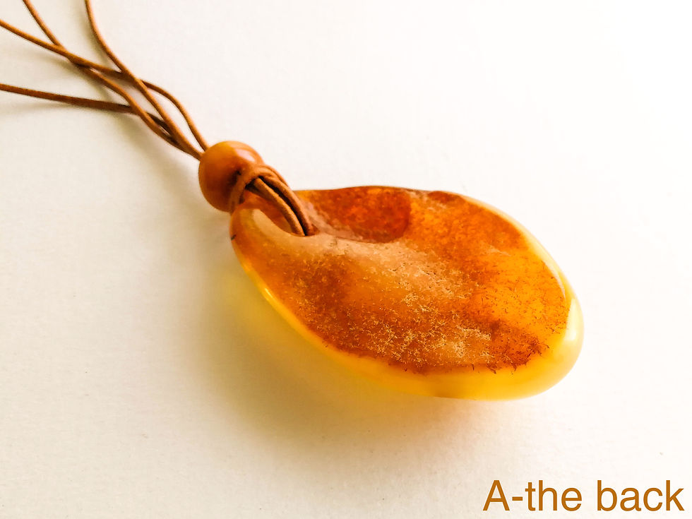 Thumbnail: Matt yellow/caramel coloramber pendant necklace on a leather strand