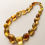 Thumbnail: Green amber large oval beads necklace