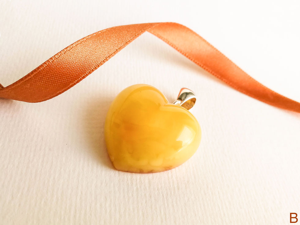 Thumbnail: Large natural not heated matt yellow amber heart pendant
