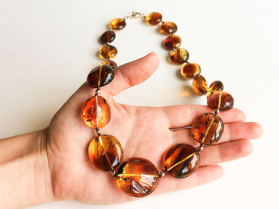 Thumbnail: Large coin shape royal cognac color natural amber statement necklace