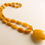 Thumbnail: Natural Baltic Amber necklace with a pendant in egg yolk yellow