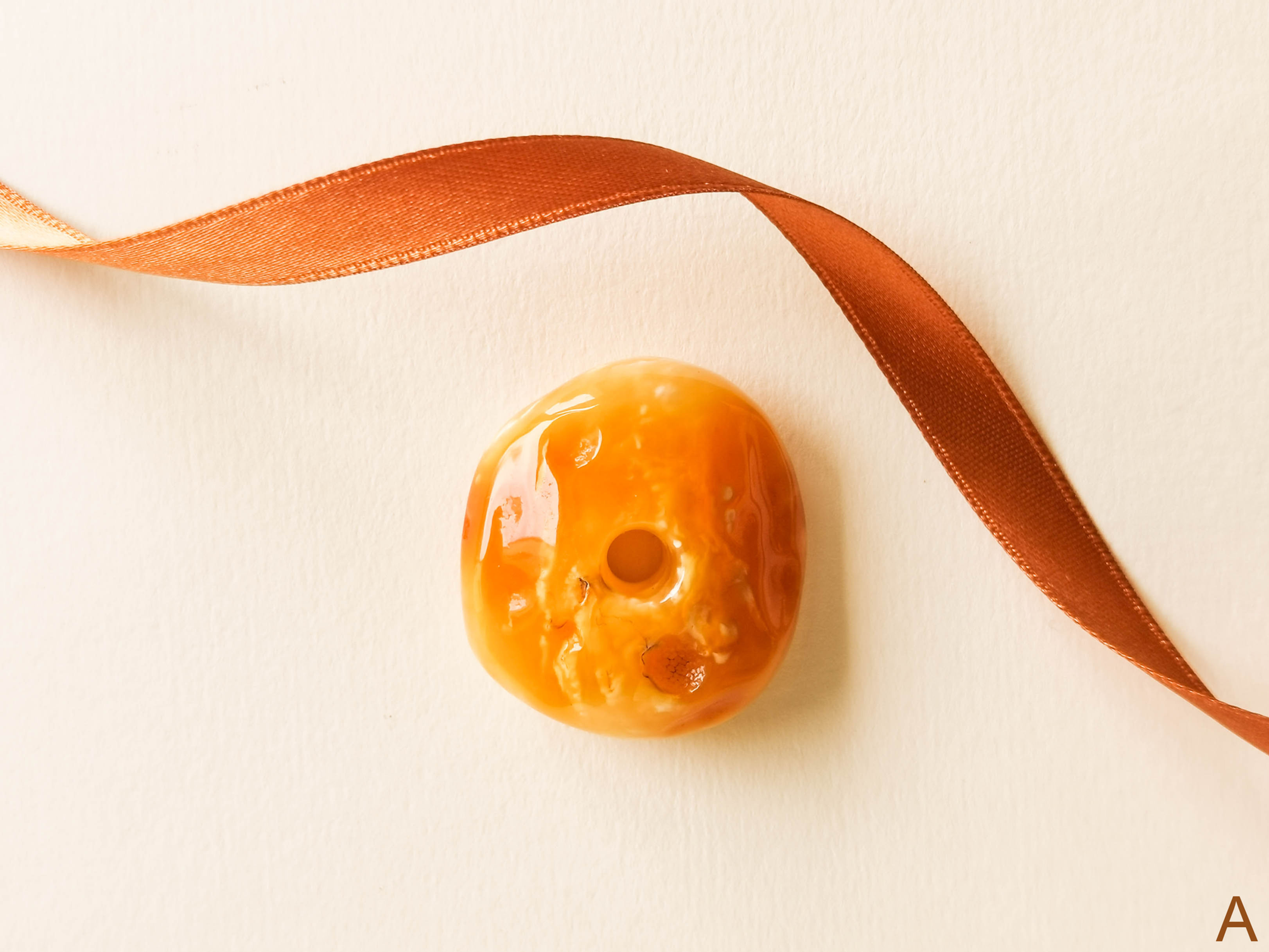 Bright matt yellow natural amber large donut pendant