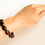 Thumbnail: Oval beads dark cherry color amber bracelet