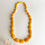 Thumbnail: Matt yellow large and thick oval beads amber necklace