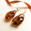 Thumbnail: Dark cognac color large unique shape genuine amber earrings